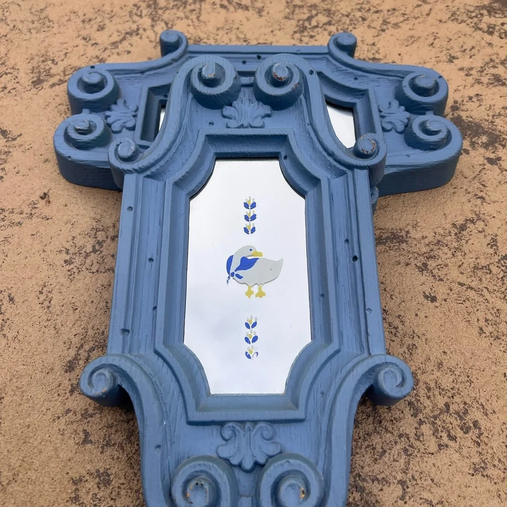 Blue Ornate Wall Mirrors with white duck on mirror‎